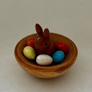 WOOD RABBIT IN BOWL WITH EASTER EGGS